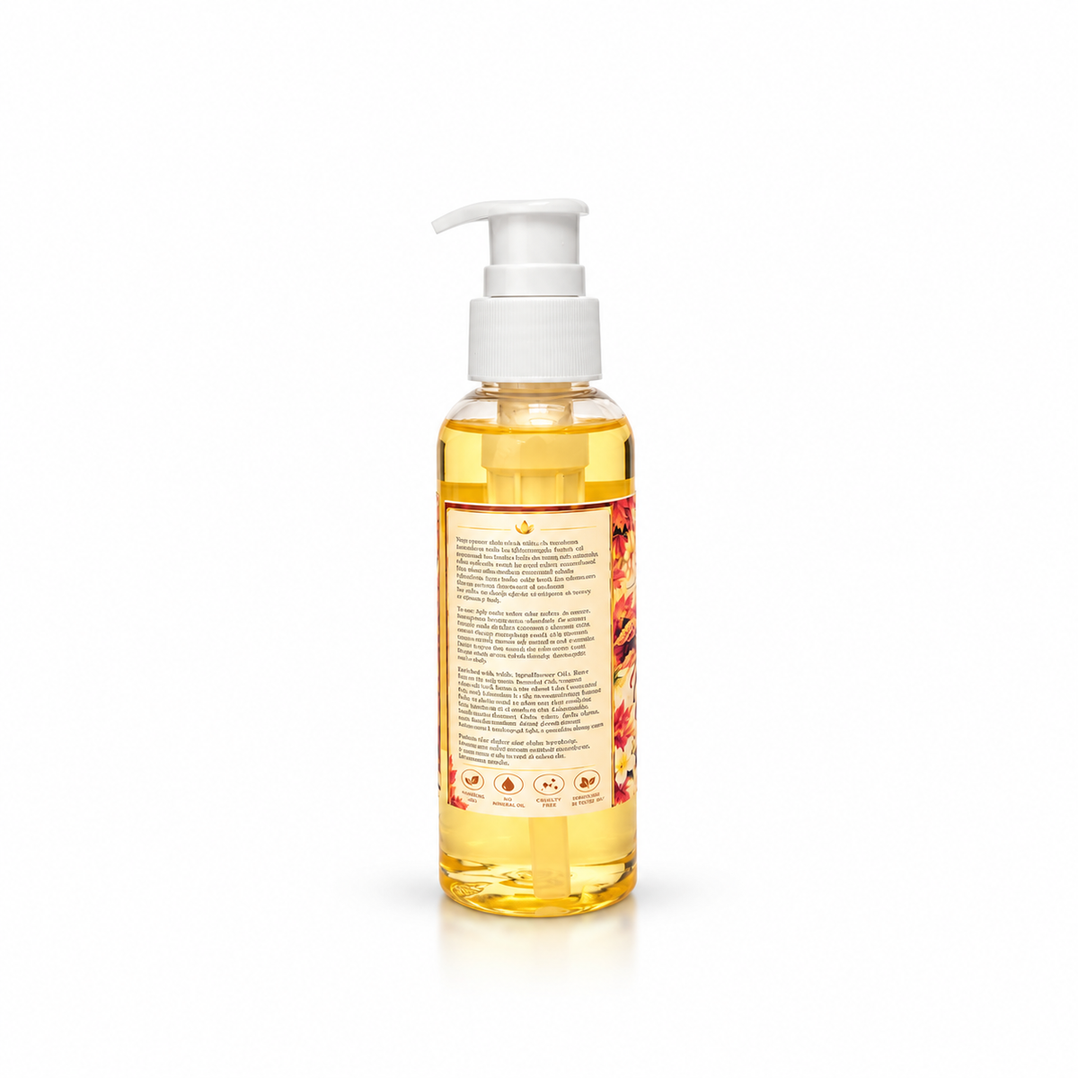 A clear pump bottle filled with golden yellow liquid, showing the back label with text and botanical illustrations, on a white background.