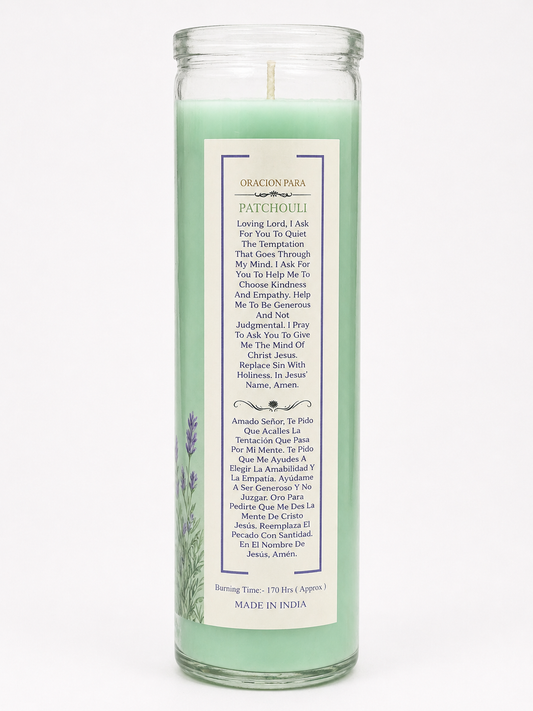 Green candle with a white label on a white background