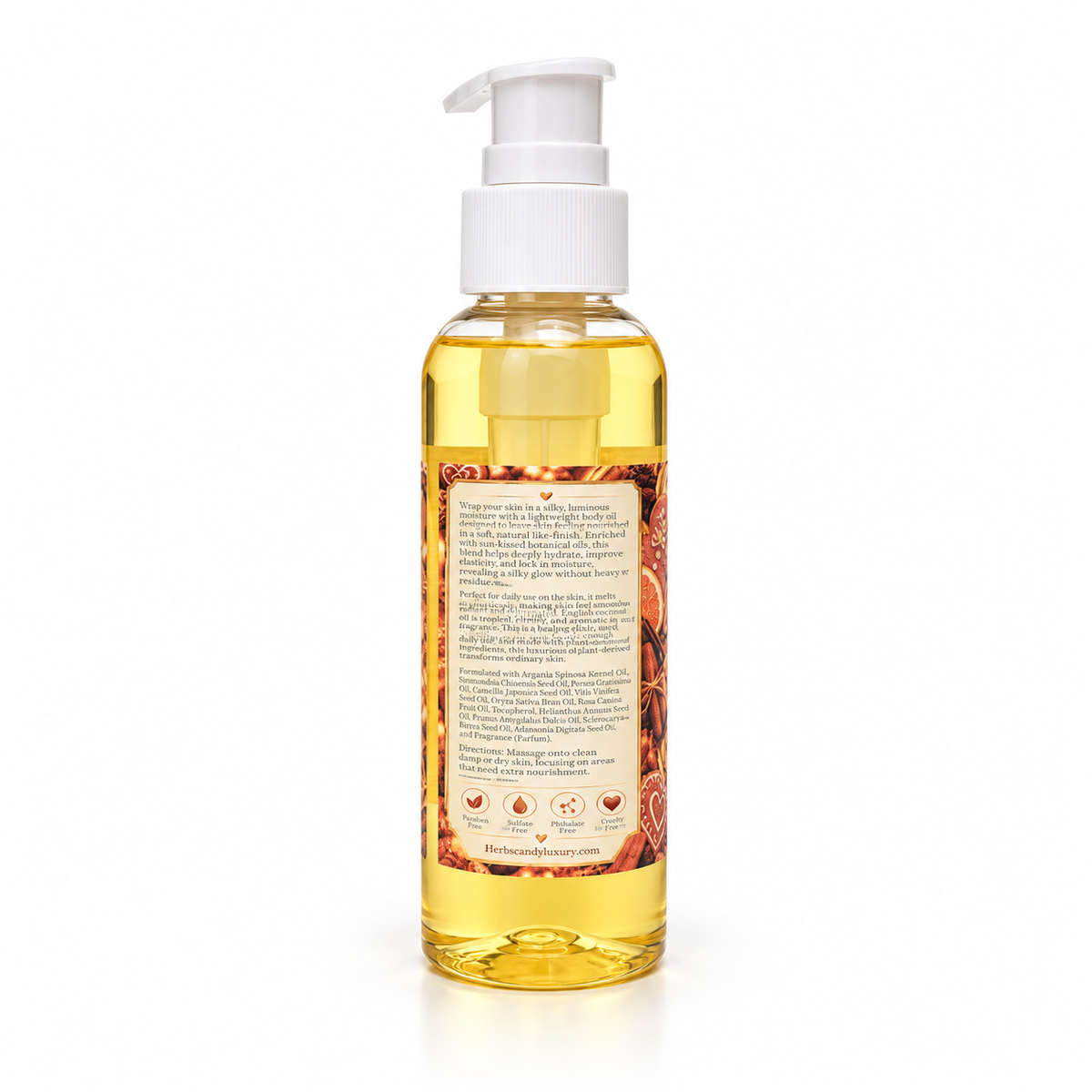 A clear bottle of golden yellow hair oil with a white pump dispenser, showing the back label with text and illustrations, on a white background.