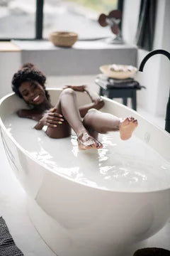 Woman talking milk bath