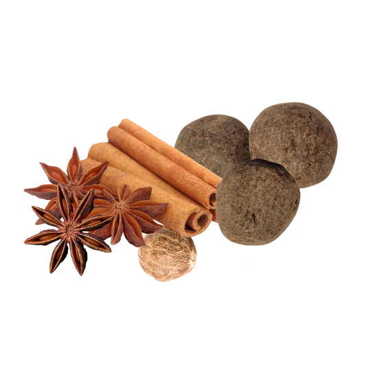 Cocoa ball with Spices including cinnamon sticks, star anise, and whole nutmeg on a white background