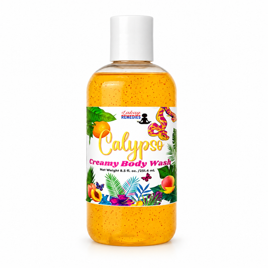 A bottle of Calypso Creamy Body Wash by Lakay Remedies, featuring a clear plastic bottle filled with orange-yellow speckled body wash and a white cap, set against a plain white background.