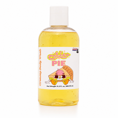 A bottle of Cutie Pie Body Wash featuring a clear plastic bottle filled with yellow liquid and a white cap, set against a plain white background.