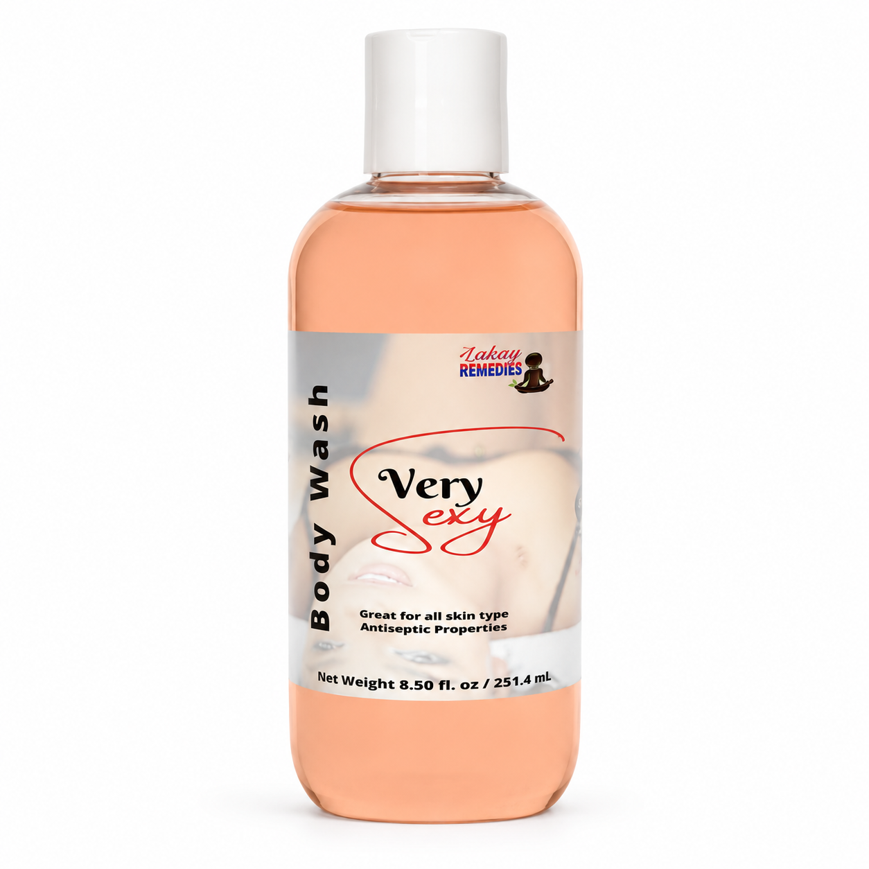 A bottle of Lakay Remedies 'Very Sexy' body wash, filled with peach-colored liquid, featuring a white cap and a white label with red and black text.