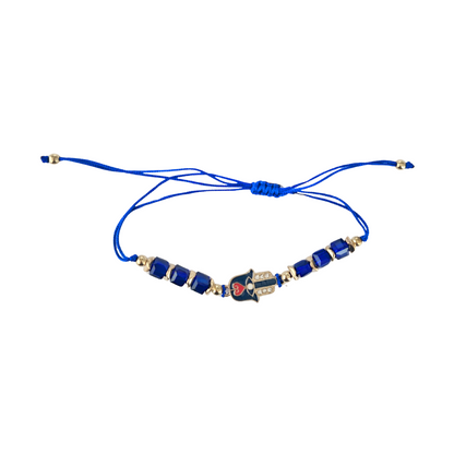Hamsa Hand Blue beaded bracelet with gold accents on a white background