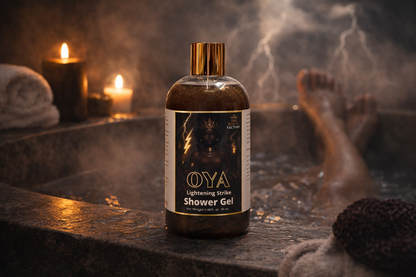 OYA shower gel bottle in a bathtub with candles and steam