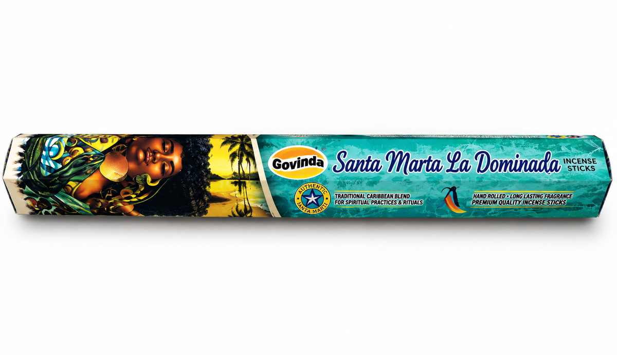 Govinda Santa Marta La Dominada incense sticks in a cylindrical cardboard tube with a teal and yellow tropical design featuring a woman's face and palm trees.