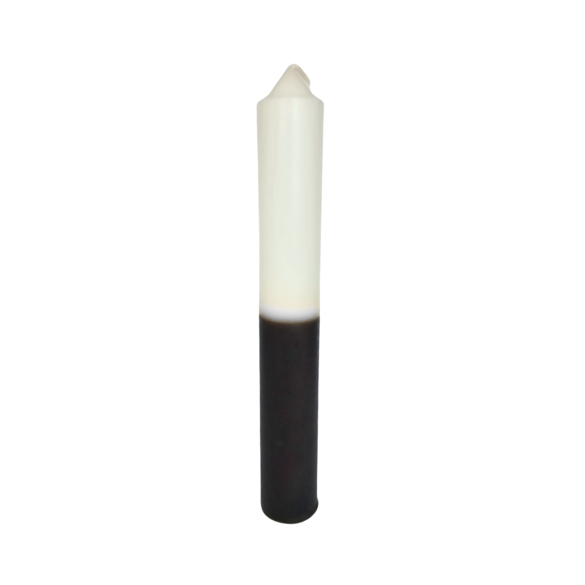 candle with white top and black bottom on a white background