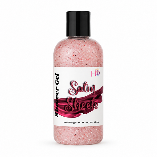 A bottle of Body Wash labeled 'Satin Sheets' with pink glitter gel visible inside, a black cap, and a white label, centered on a light gray background.