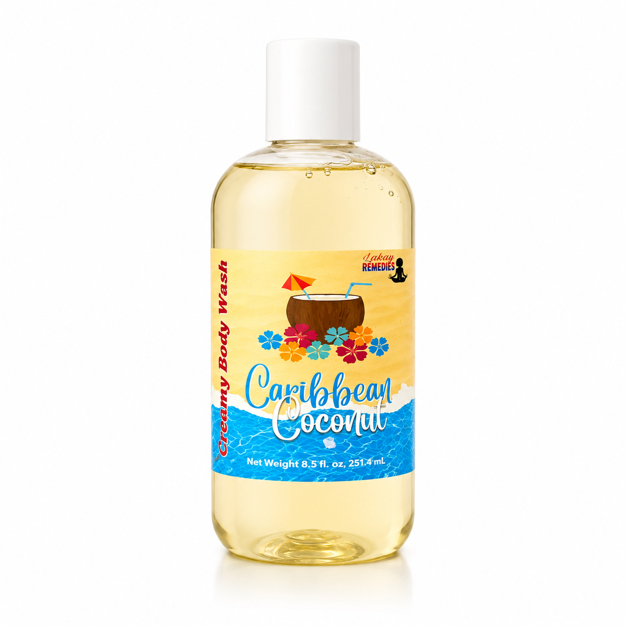 A bottle of Caribbean Coconut Creamy Body Wash by Lakay Remedies. The product is a clear plastic bottle filled with a pale yellow liquid, featuring a white cap and a colorful tropical-themed label with a coconut drink illustration.