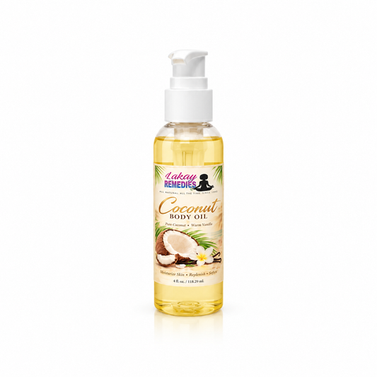A bottle of Lakay Remedies Coconut Body Oil with a white pump dispenser, filled with golden-yellow oil, set against a plain white background.