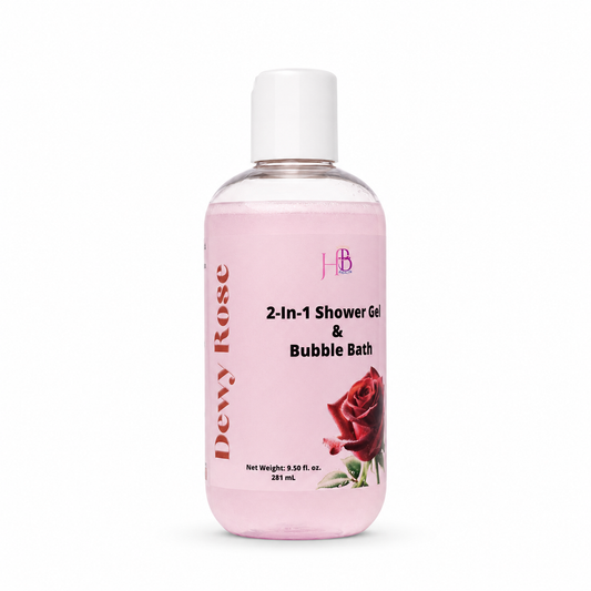 A bottle of Dewy Rose 2-In-1 Shower Gel & Bubble Bath with a white cap and a pink label featuring a rose graphic, set against a plain white background.