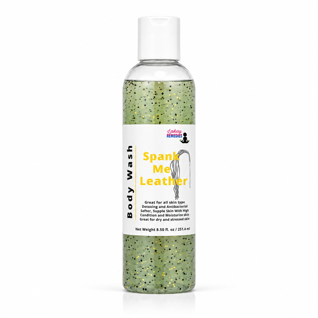A clear plastic bottle of body wash with a white cap and a white label reading 'Body Wash' and 'Spank Me Leather' in yellow text. The liquid inside is green with black and gold glitter.