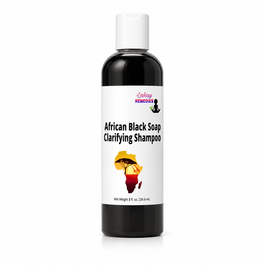 A bottle of Lakay Remedies African Black Soap Clarifying Shampoo, featuring a white cap and a white label with black text and a small graphic of Africa.