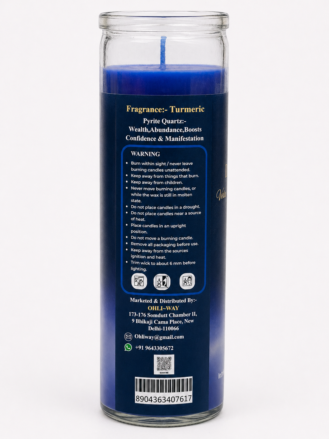 Blue candle in a glass jar with text on a white background