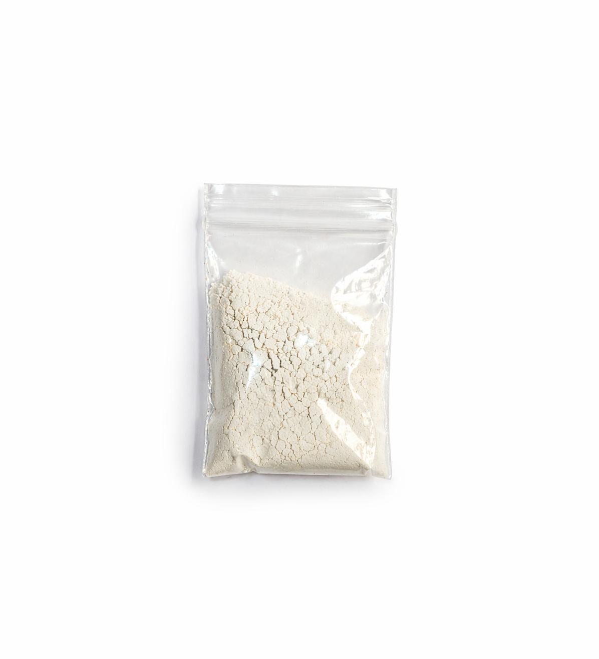 Clear plastic bag with white powder on a white background