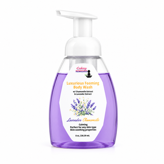 A bottle of Sakai Remedies Lavender Chamomile Luxurious Foaming Body Wash, featuring a purple liquid inside a clear bottle with a white pump dispenser and a white label.