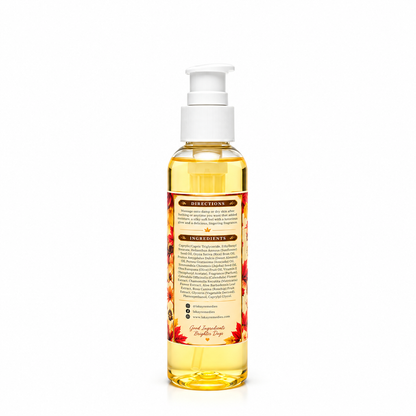 A bottle of body oil with a white pump dispenser, filled with a golden yellow liquid, shown against a plain white background.