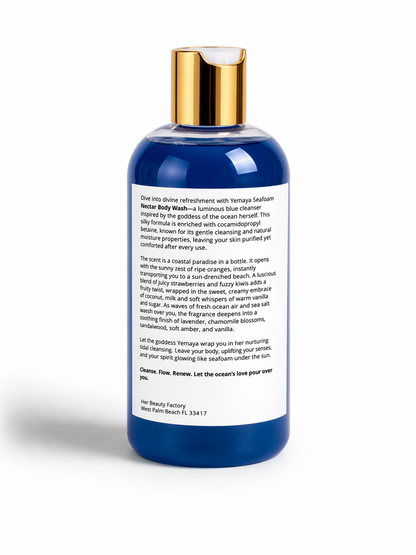 Yemaya Seafoam Nectar Shower Gel in a blue bottle with gold cap by Her Beauty Factory