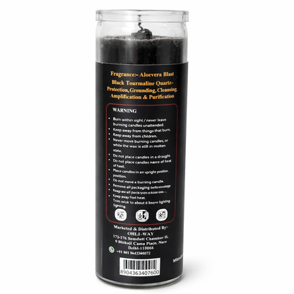 Black candle in a glass jar with label on a white background