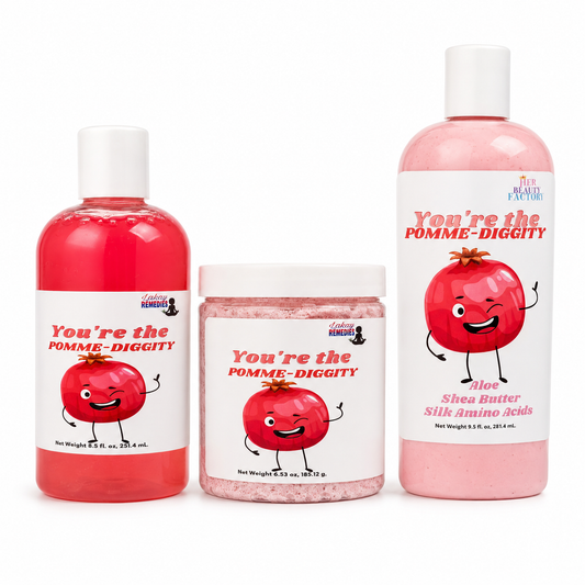 Three products on a white background: a red bottle of Pomme-Diggity Body Wash, a jar of Pomme-Diggity body scrub, and a pink bottle of Aloe Shea Butter Silk Amino Acids Lotion.