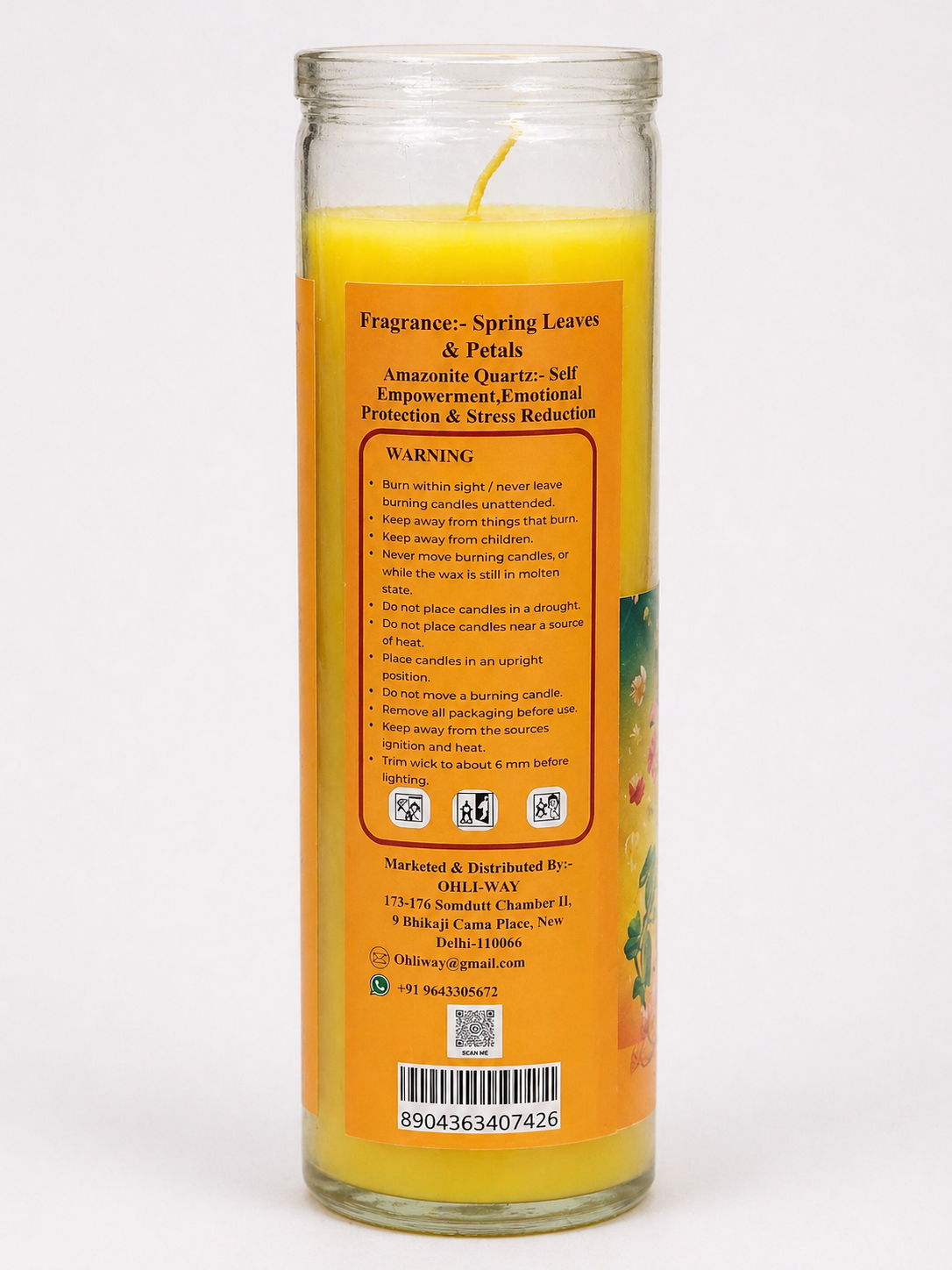 Candle with label on a white background