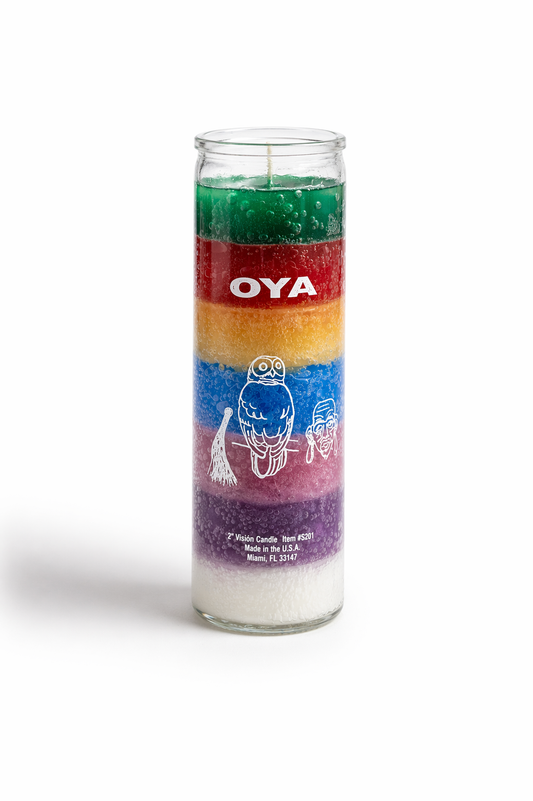 Colorful candle with 'Oya' branding on a white background