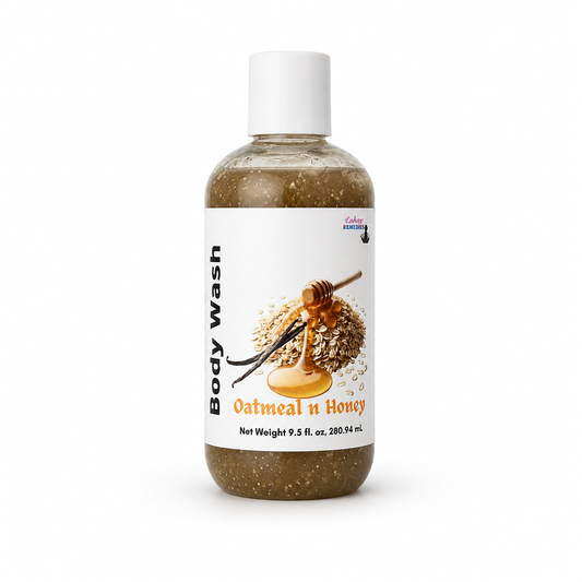 A bottle of body wash labeled 'Oatmeal n' Honey' , featuring a white cap and a white label with an illustration of oats, honey, and a honey dipper, set against a plain white background.
