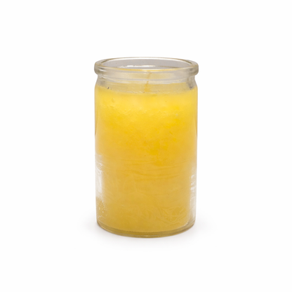 Clear glass jar filled with yellow candle on a white background
