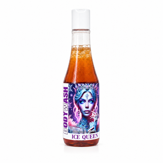 A bottle of 'Ice Queen' body wash with a white cap, showing the amber liquid inside and a colorful label featuring a stylized portrait.