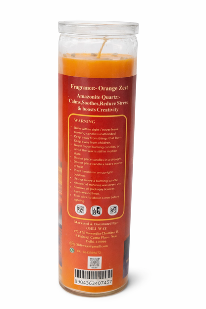 Candle with an orange label on a white background