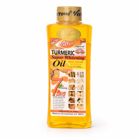 Bottle of Vee Gold Turmeric Super Whitening Oil on a white background