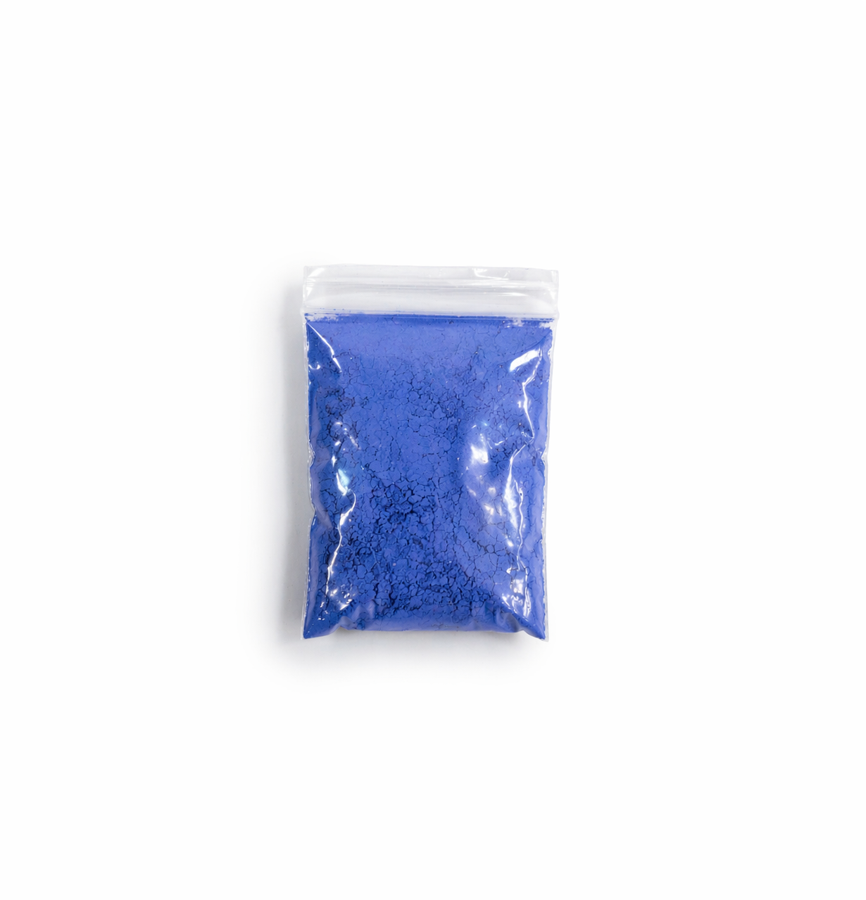 Blue powder in a clear plastic bag on a white background