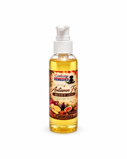 A bottle of Lekay Remedies Autumn Fig  Body Oil with a white pump dispenser, containing golden yellow oil, set against a plain white background.