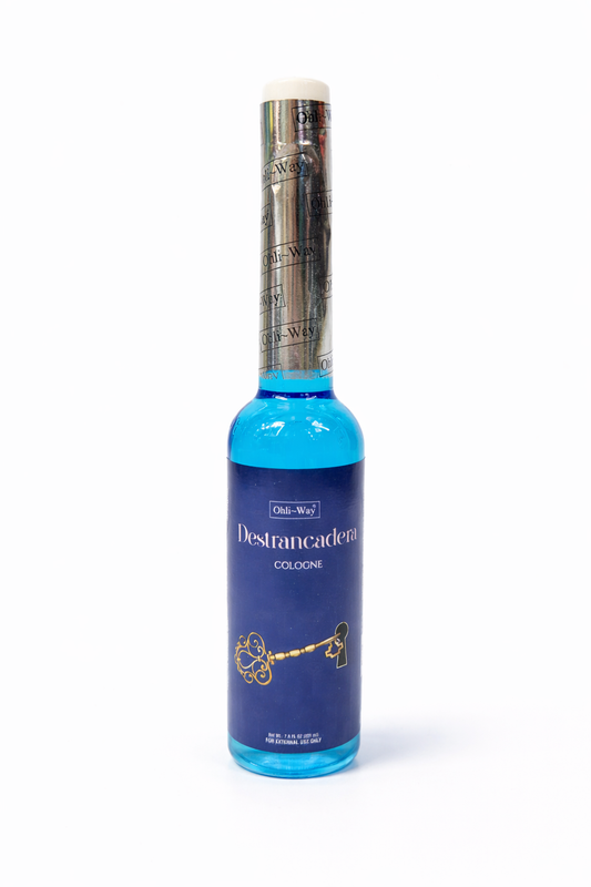 Blue bottle with silver cap on a white background